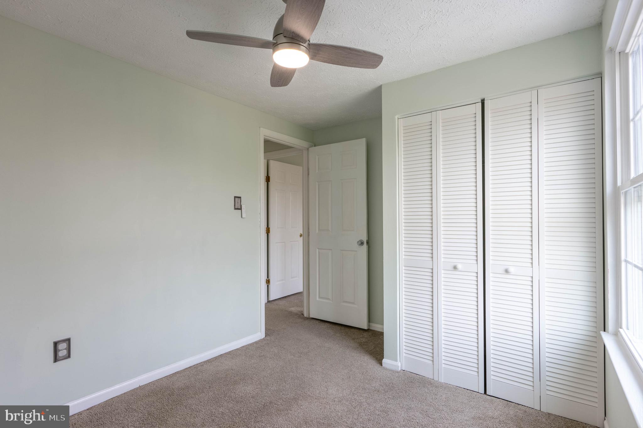 27 Cavan Green Nottingham, MD 21236 - Photo 19 of 31 a view of a livingroom with a ceiling fan and window