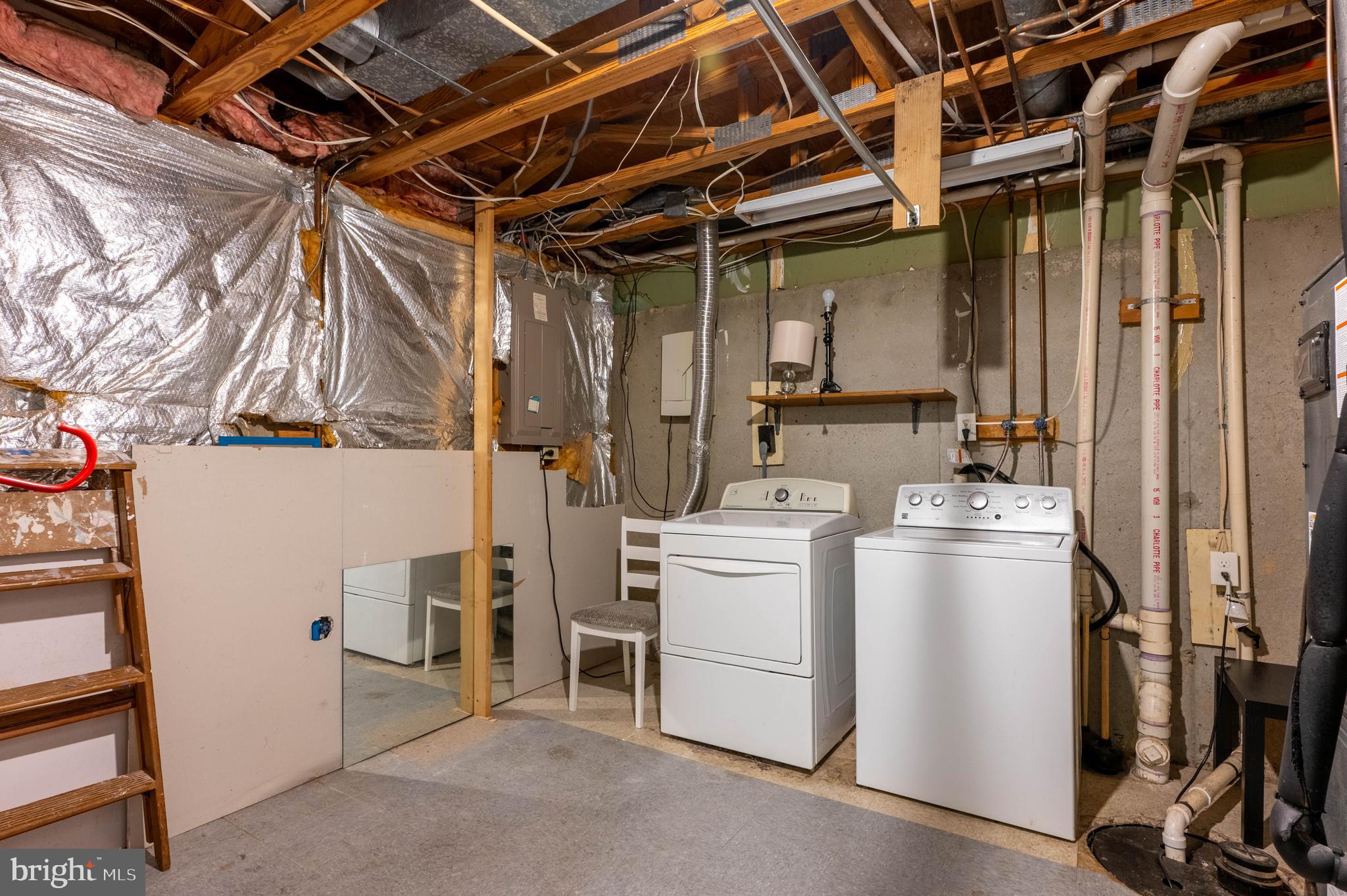 27 Cavan Green Nottingham, MD 21236 - Photo 26 of 31 a view of a storage & utility room with dryer and washer