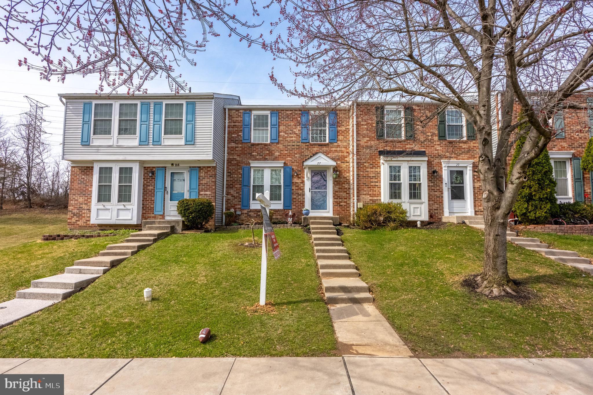 27 Cavan Green Nottingham, MD 21236 - Photo 4 of 31 a front view of a house with a yard