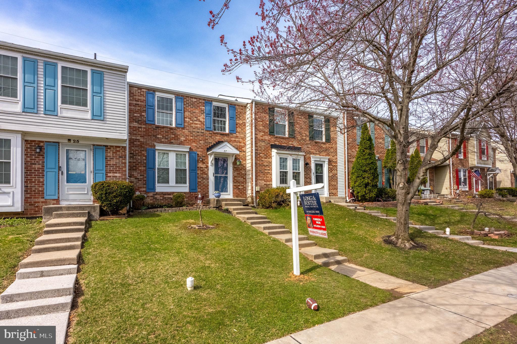 27 Cavan Green Nottingham, MD 21236 - Photo 5 of 31 a front view of a house with a yard