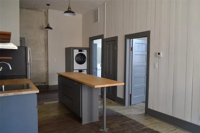 a room with a table and chairs