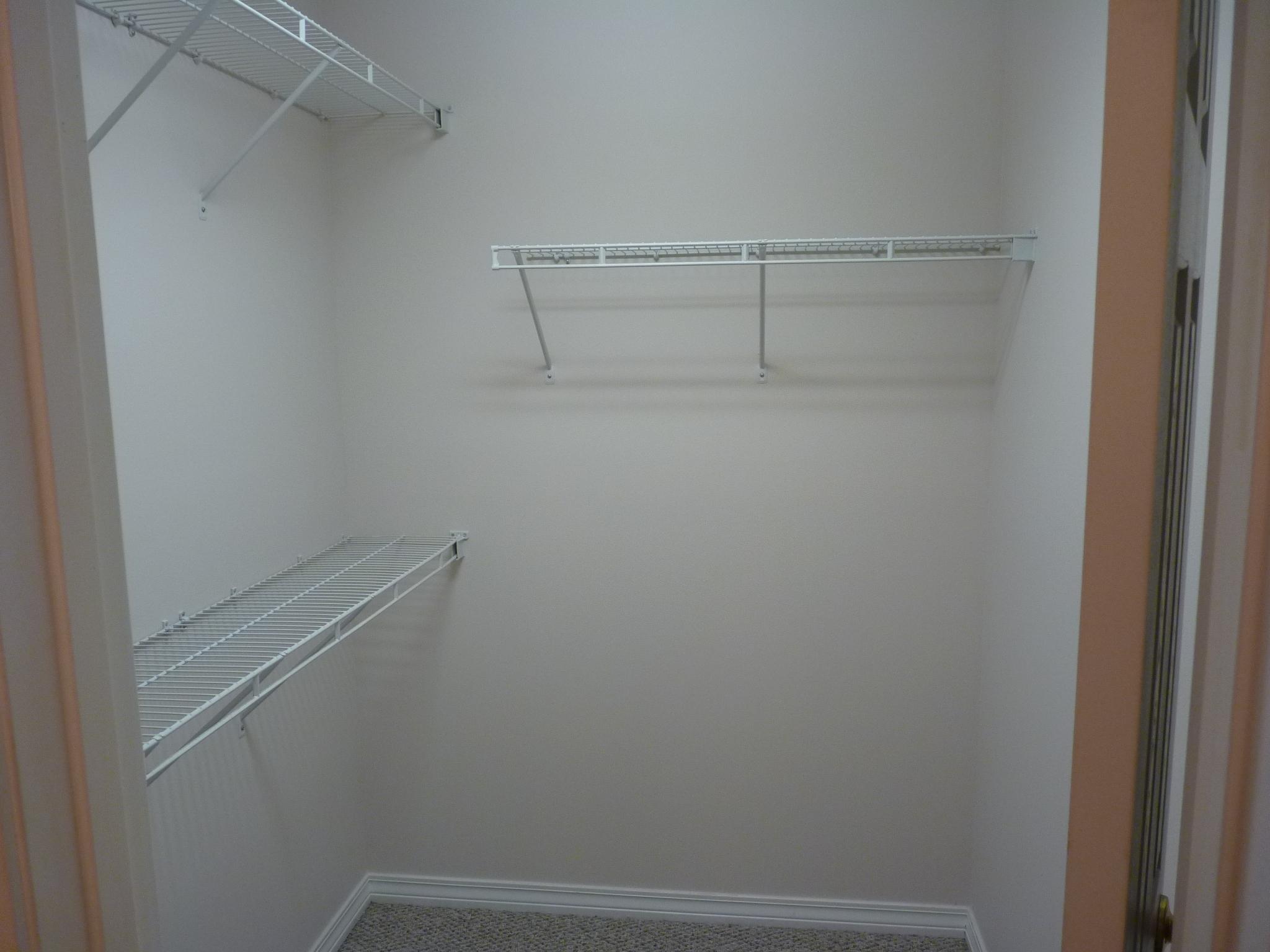 5814 Dairy Road Baker, FL 32531 - Photo 16 of 29 a view of a room with racks on the wall