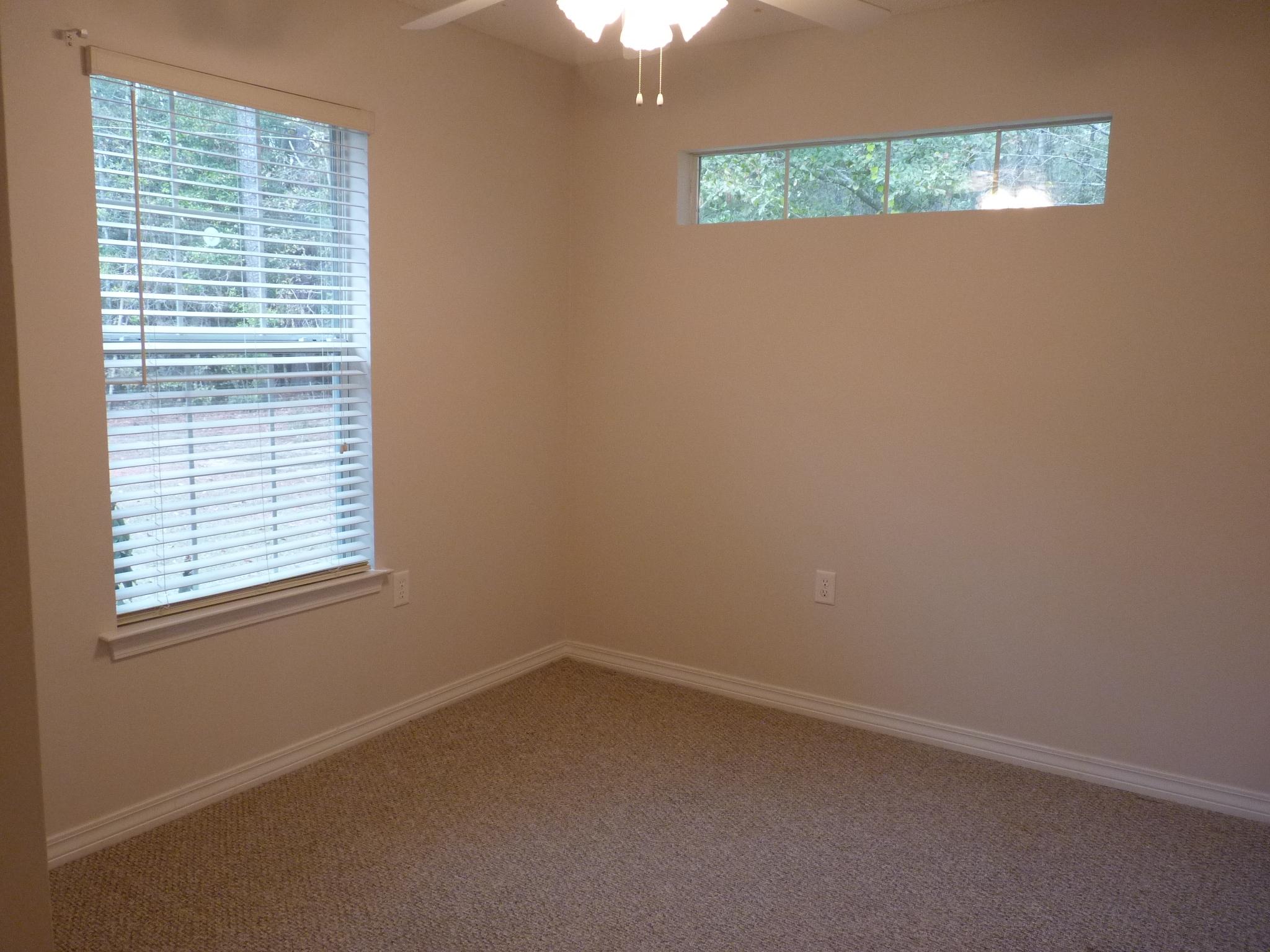 5814 Dairy Road Baker, FL 32531 - Photo 19 of 29 an empty room with a window