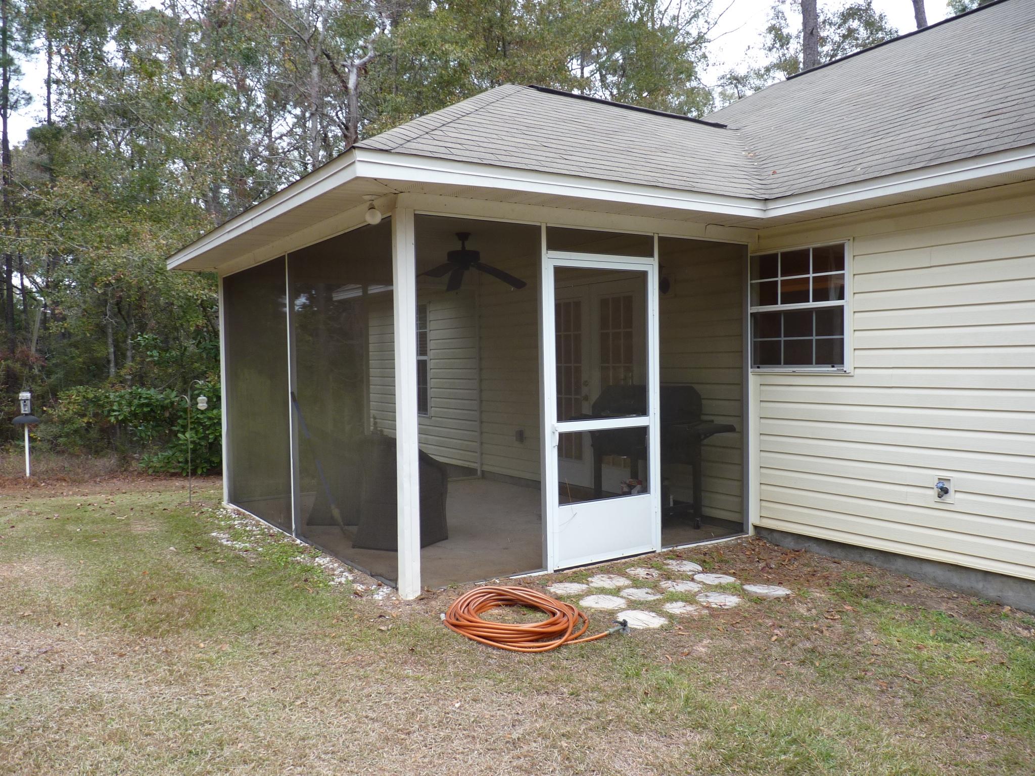 5814 Dairy Road Baker, FL 32531 - Photo 24 of 29 a view of backyard of house