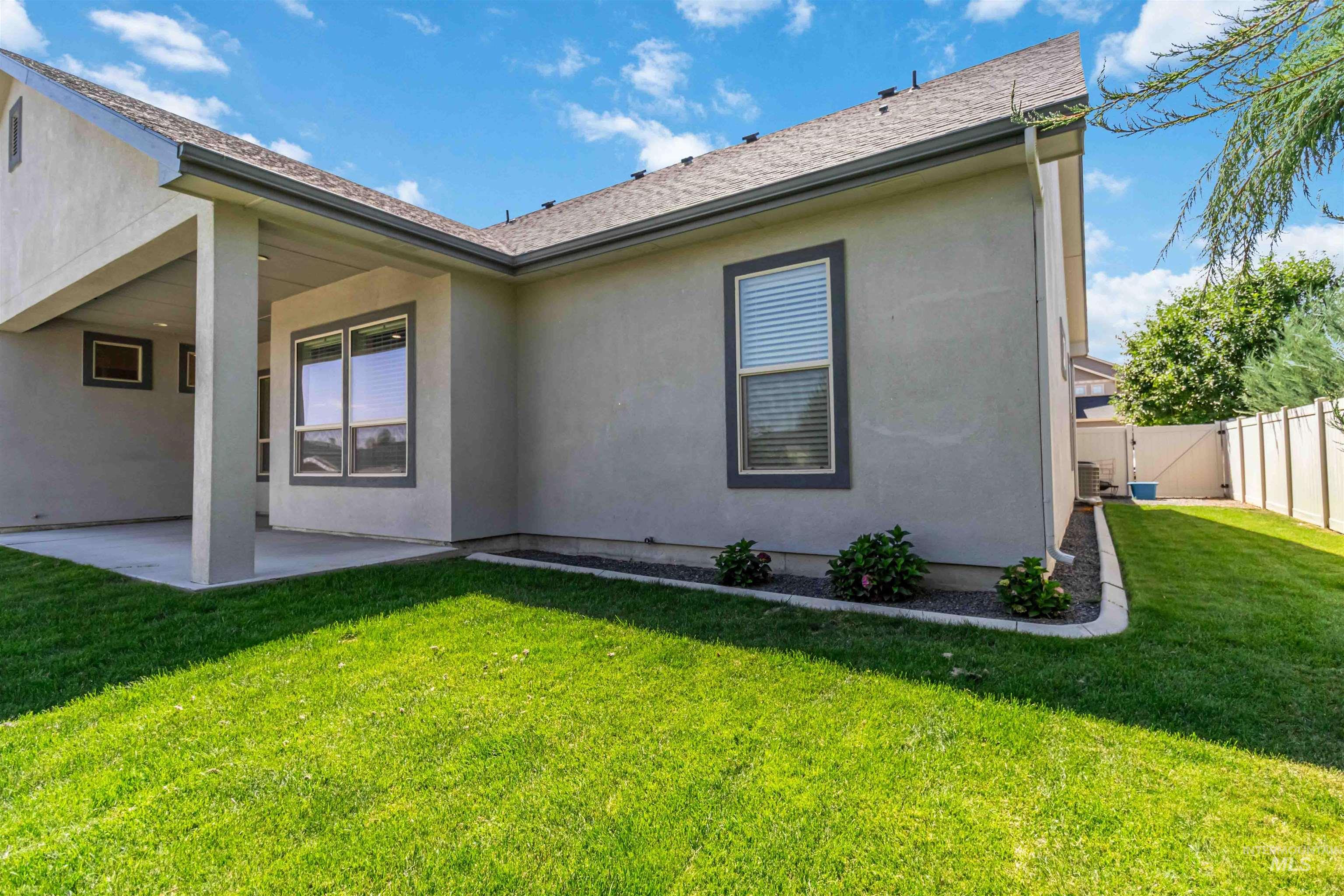 3218 North Cherry Laurel Way Star, ID 83669 - Photo 45 of 50 Covered patio featuring recessed lighting, a concrete slab, and stucco exterior
