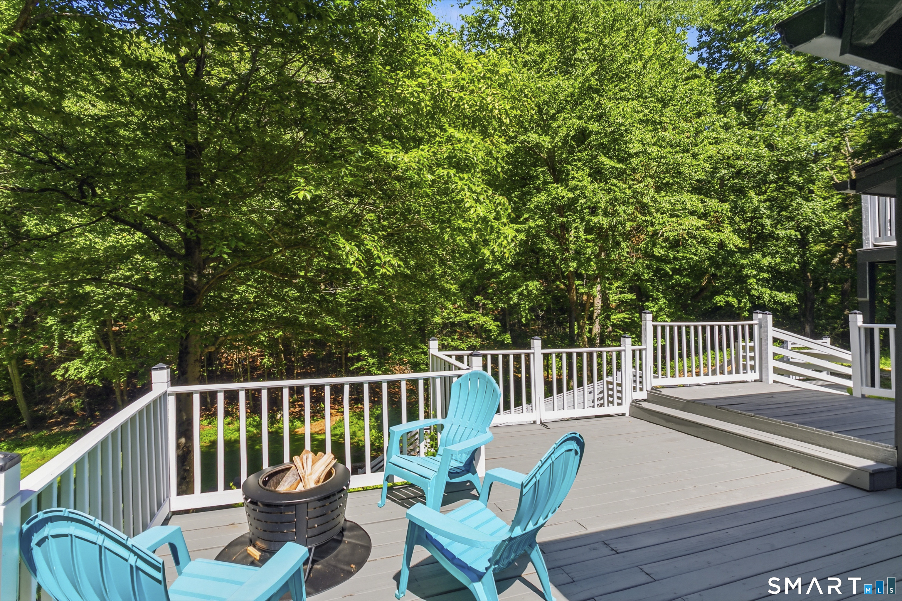 188 Bacon Road Roxbury, CT 06783 - Photo 29 of 33 a view of a chair and table on the wooden floor