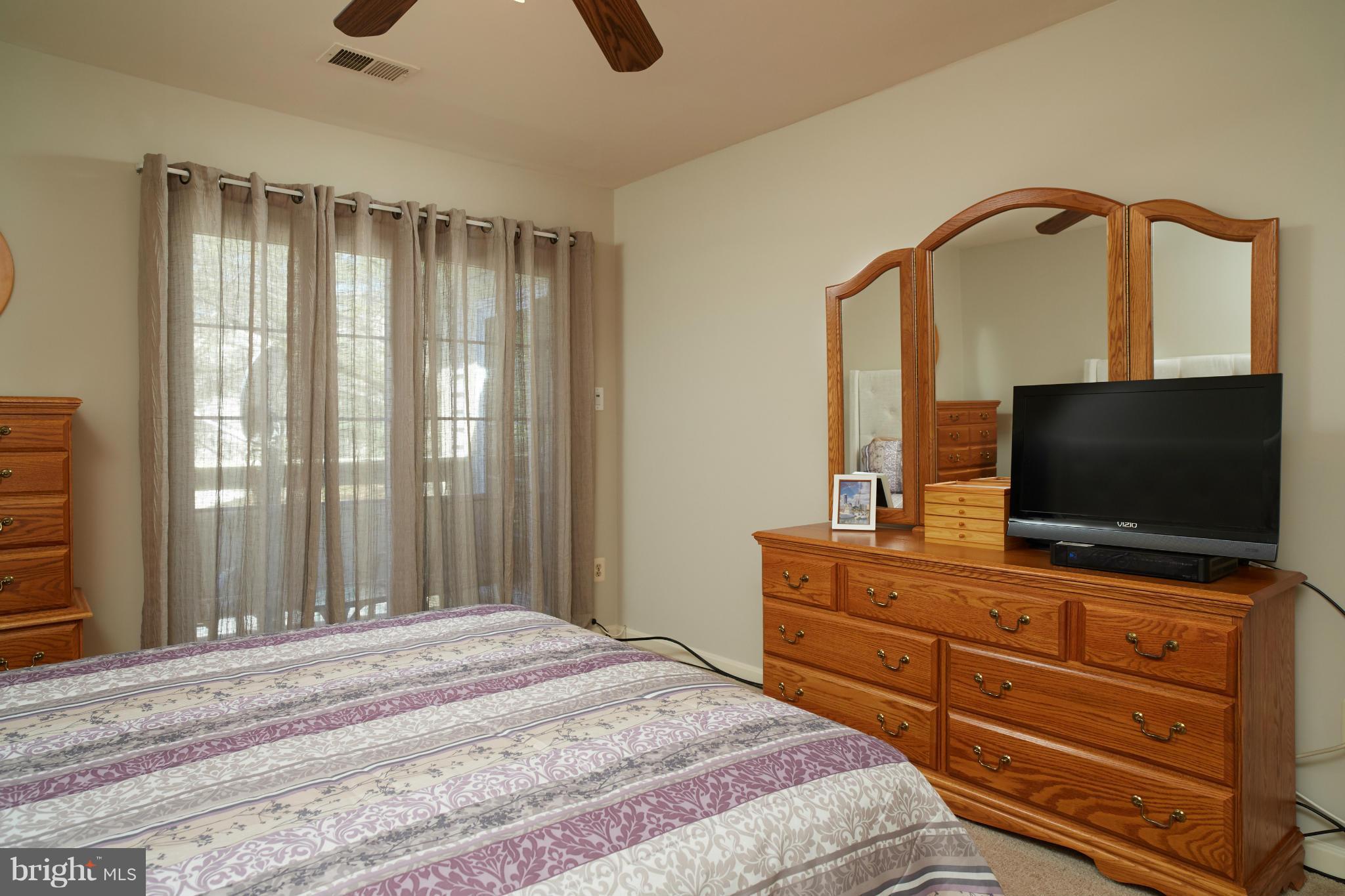 2225 Lovedale Lane, Unit 311A Reston, VA 20191 - Photo 14 of 29 Master Bedroom with Access to Deck