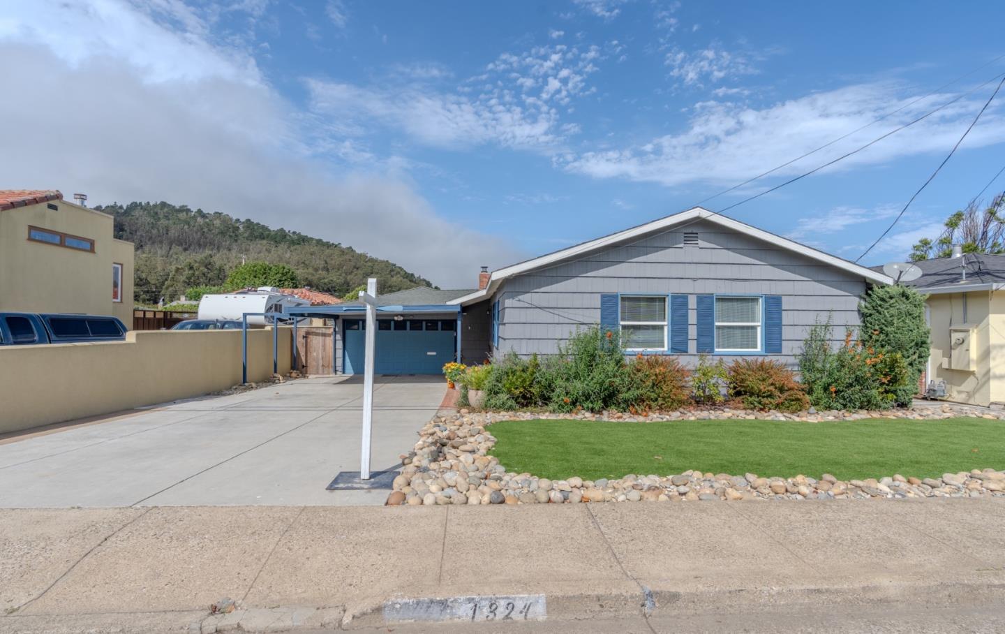 1324 Peralta Road Pacifica, CA 94044 - Photo 2 of 35 a view of a house with a yard