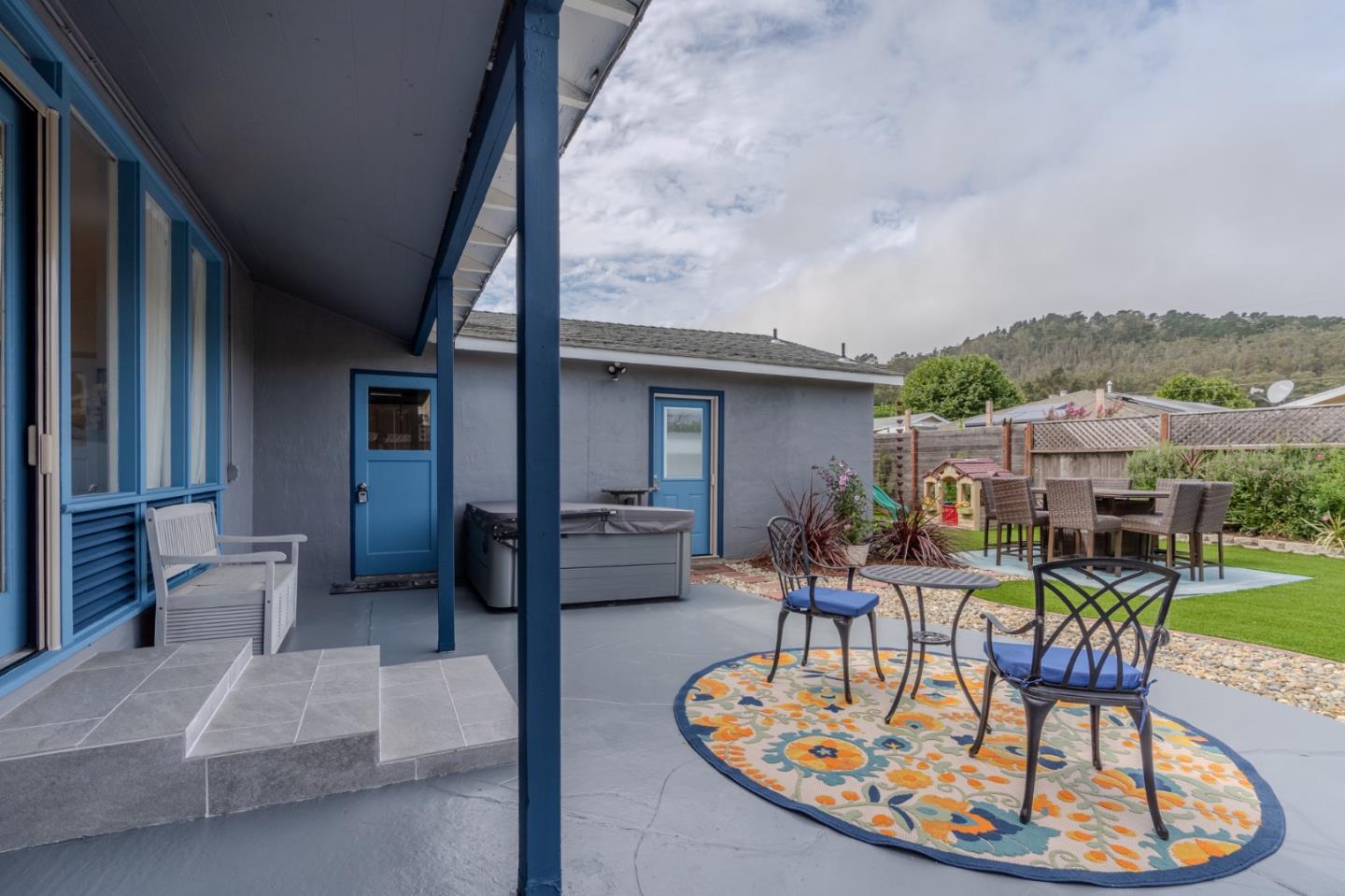 1324 Peralta Road Pacifica, CA 94044 - Photo 22 of 35 a patio with a table and chairs