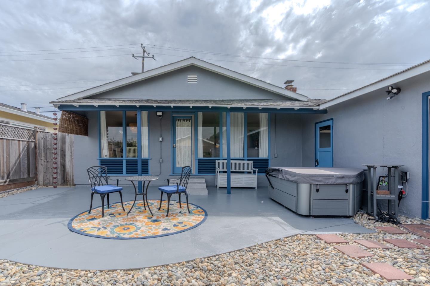 1324 Peralta Road Pacifica, CA 94044 - Photo 24 of 35 a dining room with a table and chairs