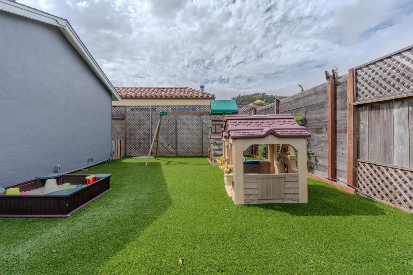1324 Peralta Road Pacifica, CA 94044 - Photo 29 of 35 a front view of a house with garden