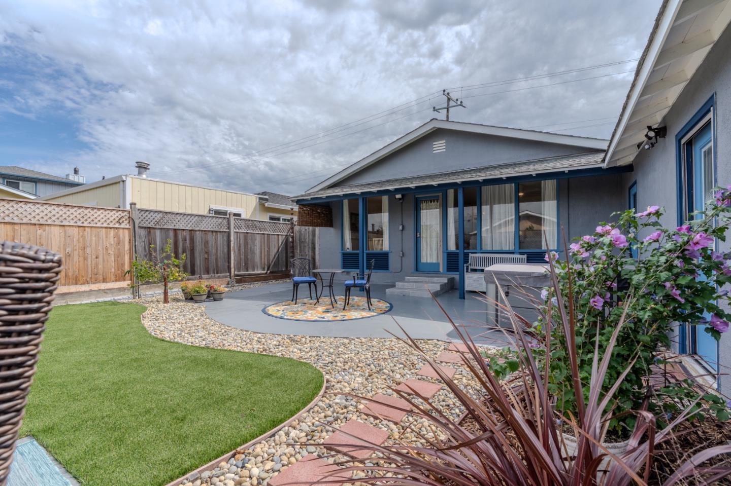 1324 Peralta Road Pacifica, CA 94044 - Photo 30 of 35 a view of a house with backyard and sitting area
