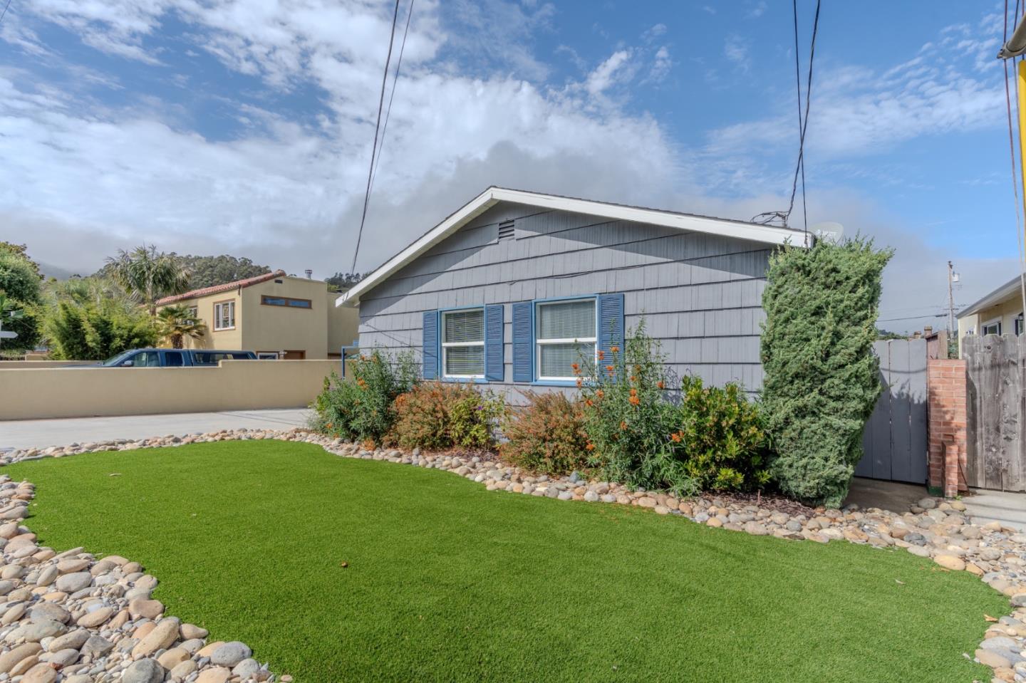 1324 Peralta Road Pacifica, CA 94044 - Photo 3 of 35 a front view of house with yard and green space