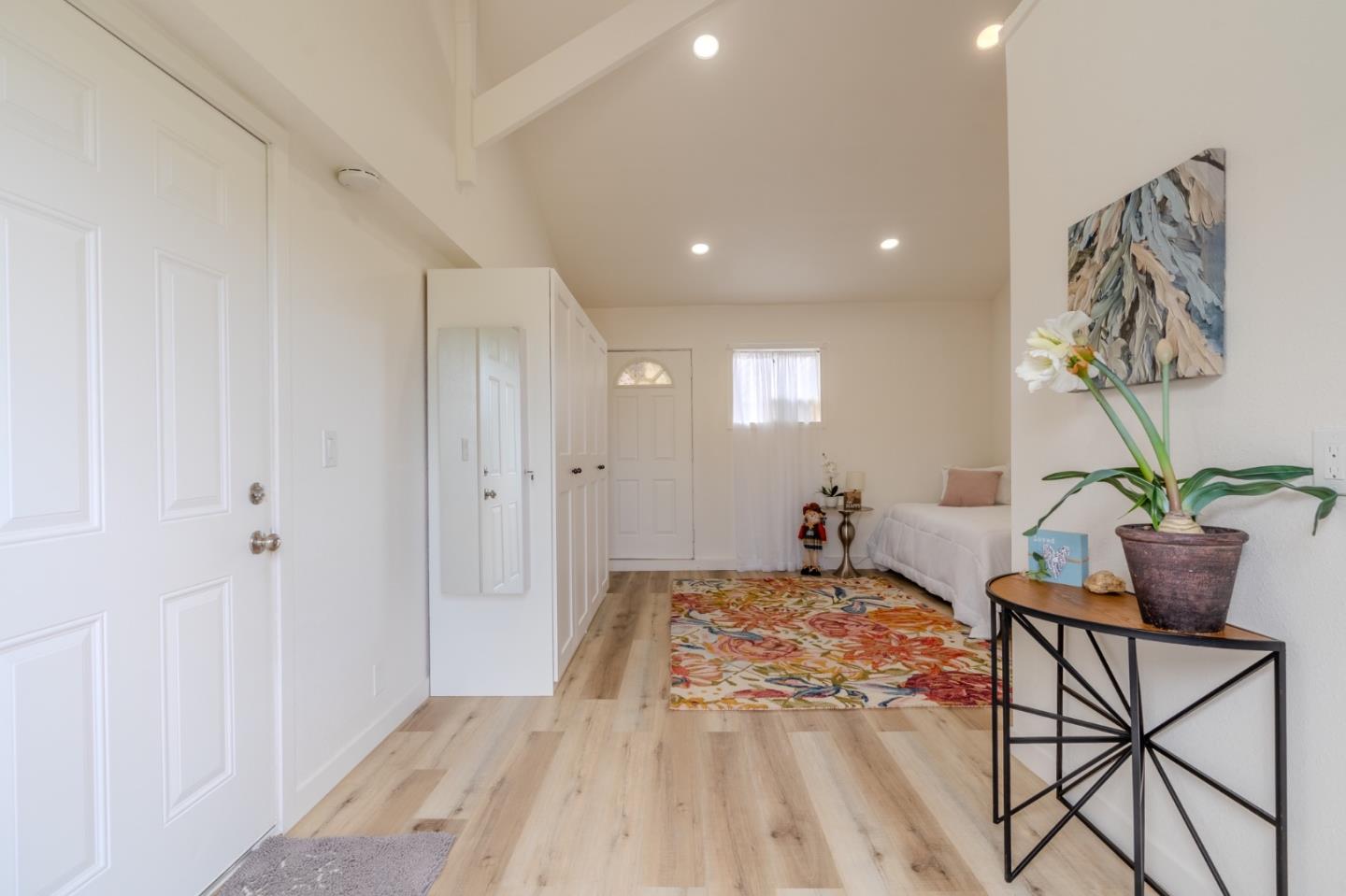 1324 Peralta Road Pacifica, CA 94044 - Photo 31 of 35 a bedroom with a bed and furniture