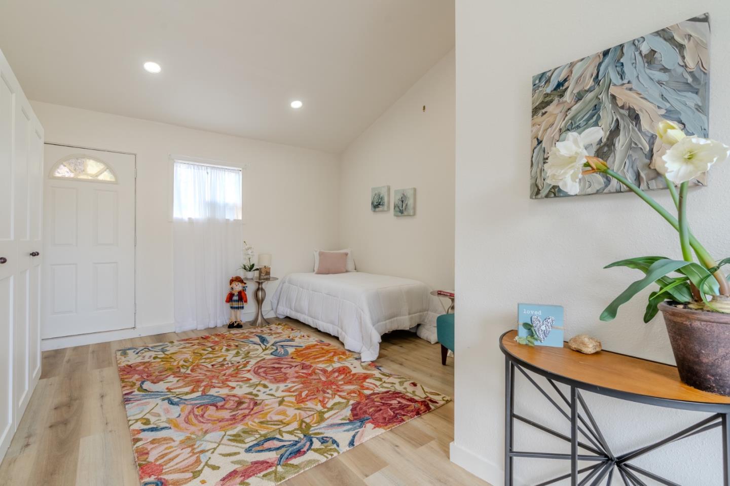 1324 Peralta Road Pacifica, CA 94044 - Photo 32 of 35 a bed room with a bed and a couch