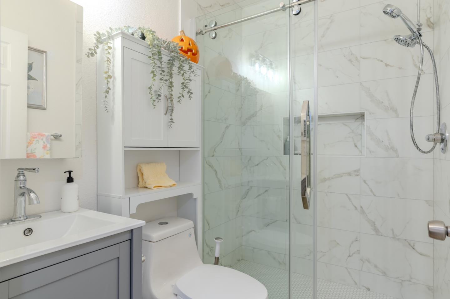 1324 Peralta Road Pacifica, CA 94044 - Photo 34 of 35 a bathroom with a shower sink mirror and toilet