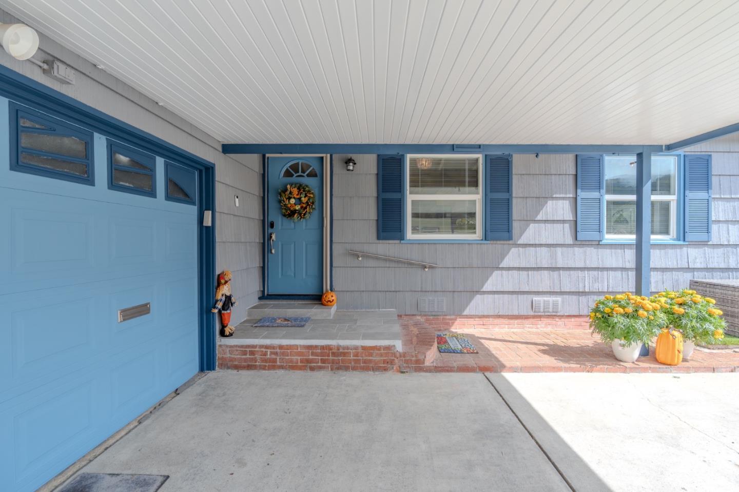 1324 Peralta Road Pacifica, CA 94044 - Photo 4 of 35 a front view of a house with a garage