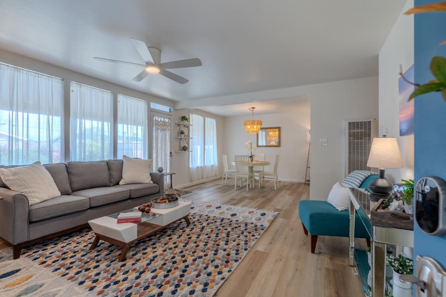 1324 Peralta Road Pacifica, CA 94044 - Photo 5 of 35 a living room with furniture and a lamp