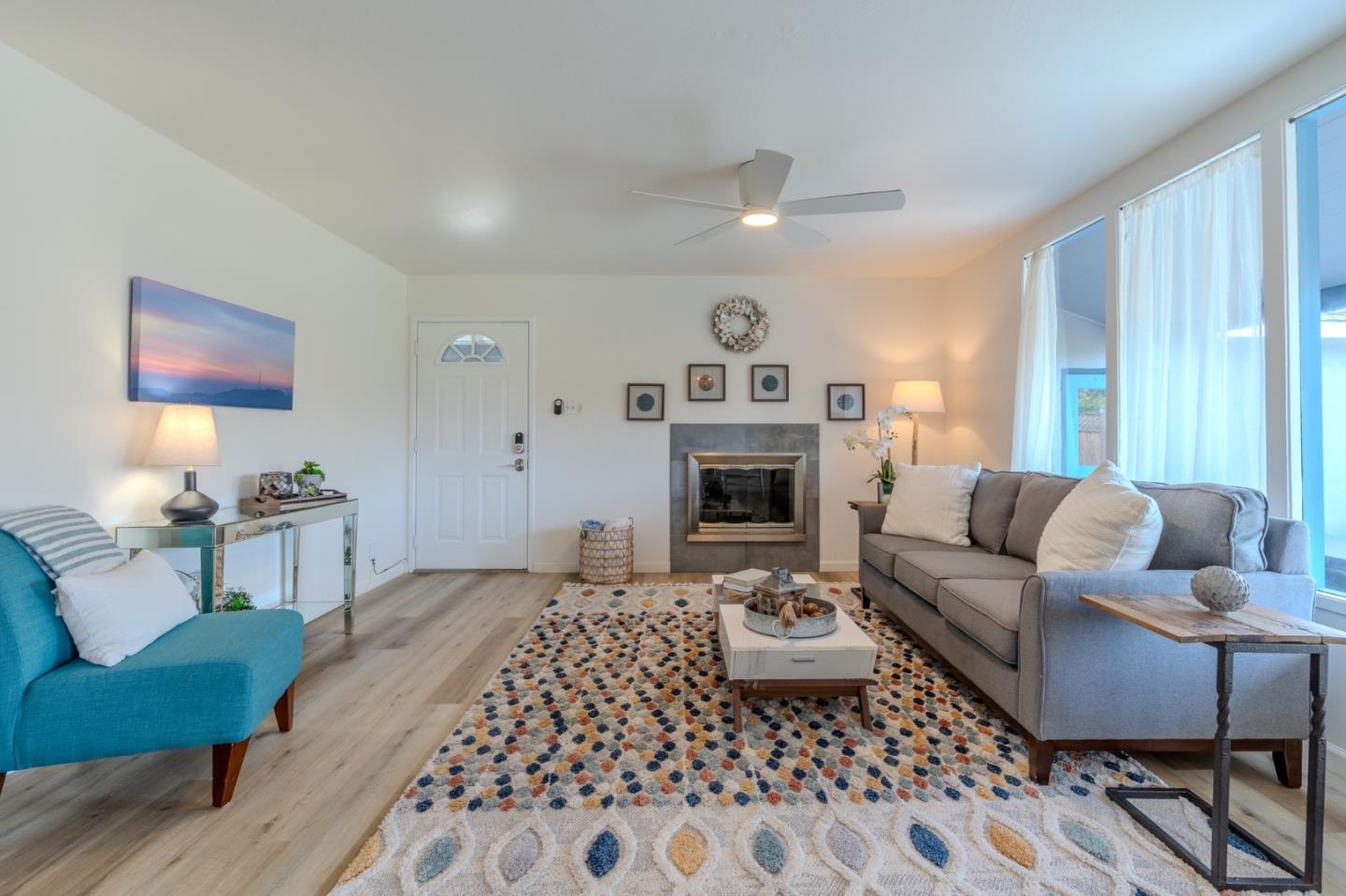 1324 Peralta Road Pacifica, CA 94044 - Photo 7 of 35 a living room with furniture and a fireplace