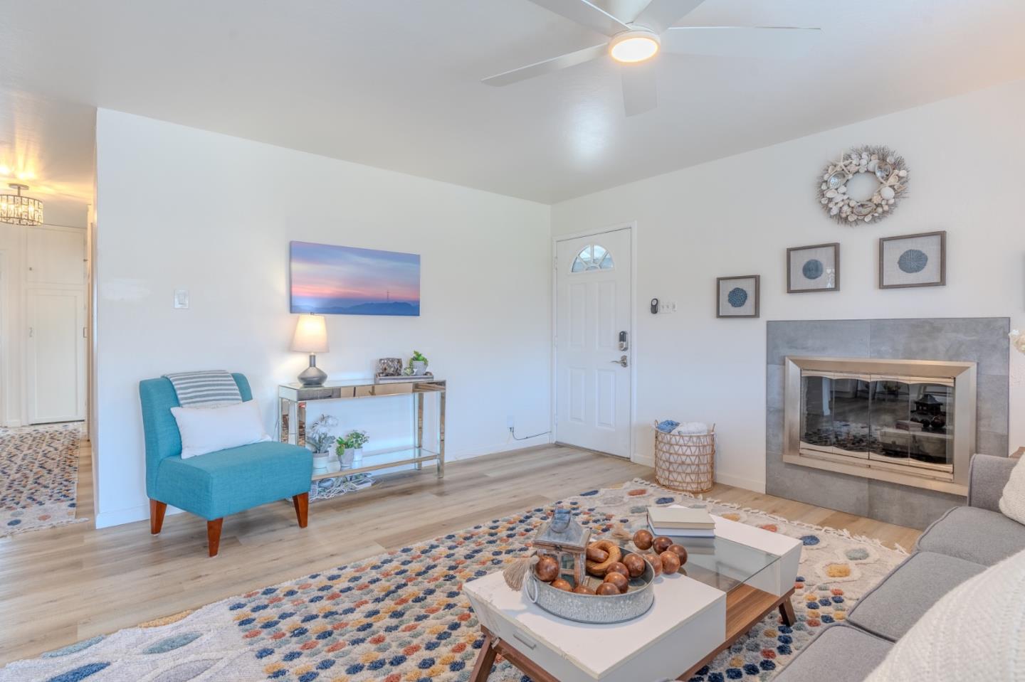 1324 Peralta Road Pacifica, CA 94044 - Photo 10 of 35 a living room with furniture and a fireplace