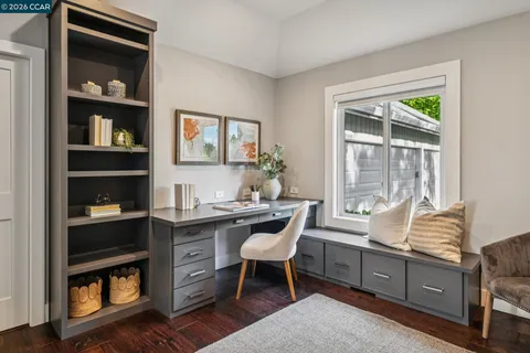 a bathroom with a tub shower vanity and a sink