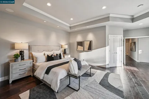a bedroom with double bed and a window