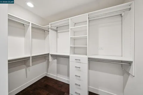 a utility room with sink dryer and washer
