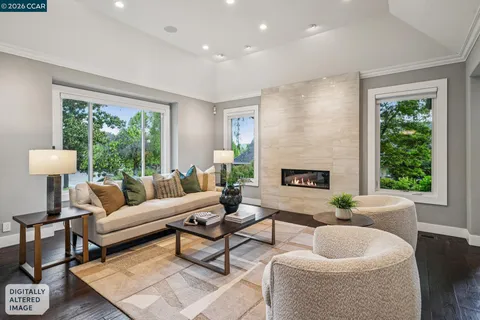 a living room with furniture and a lamp