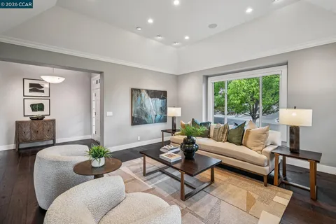 a view of a livingroom with furniture and window