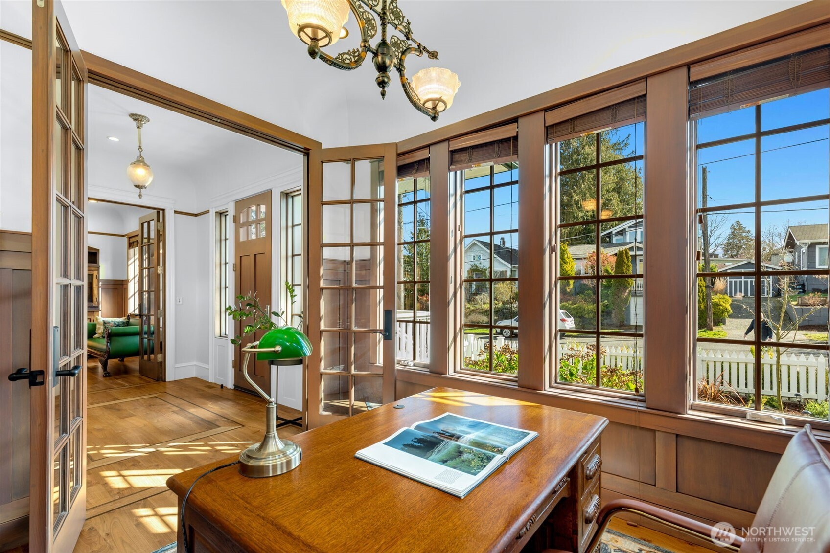 3723 41st Avenue Southwest Seattle, WA 98116 - Photo 12 of 40 a living room filled with furniture and large windows