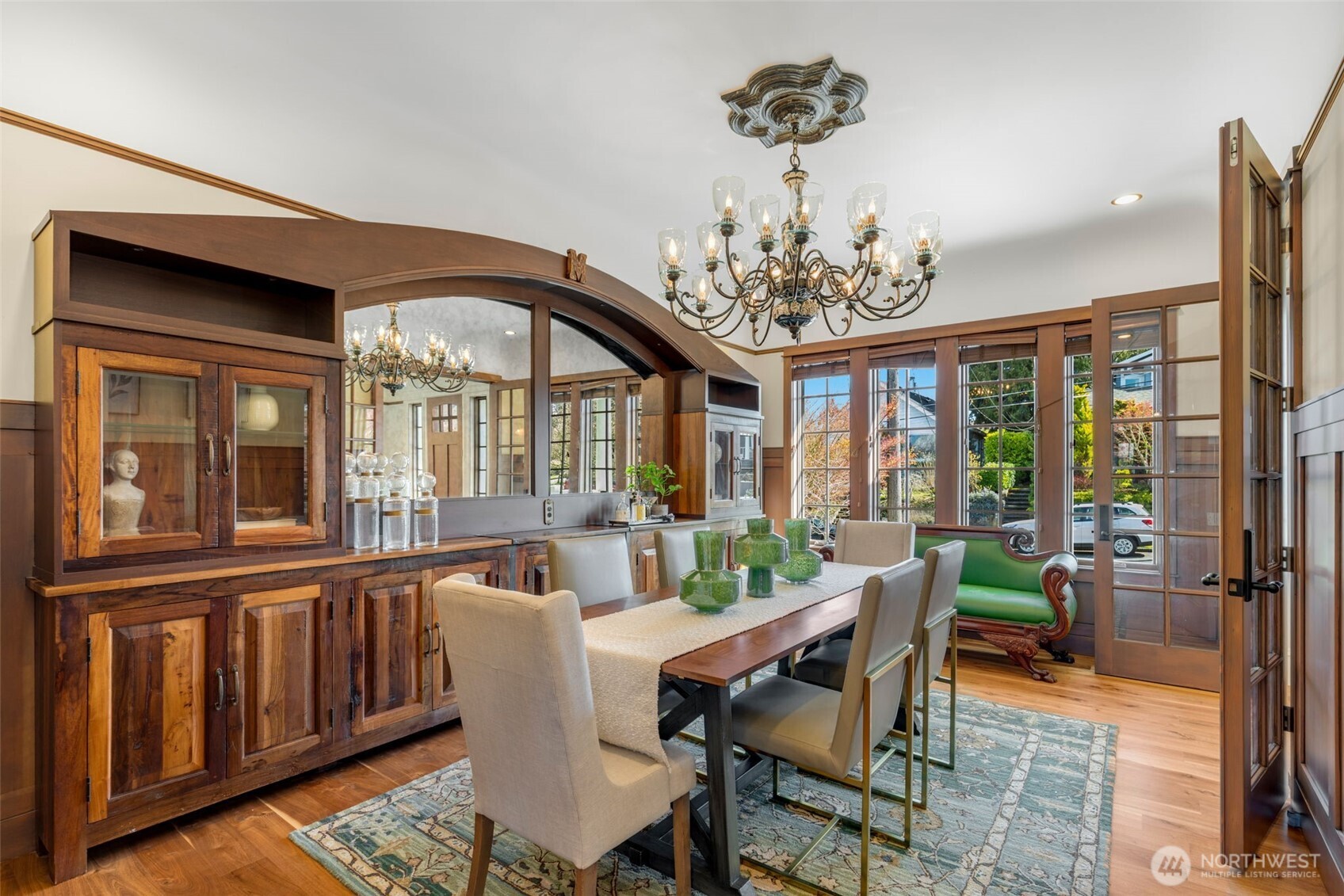 3723 41st Avenue Southwest Seattle, WA 98116 - Photo 13 of 40 a dining room with furniture a chandelier and wooden floor