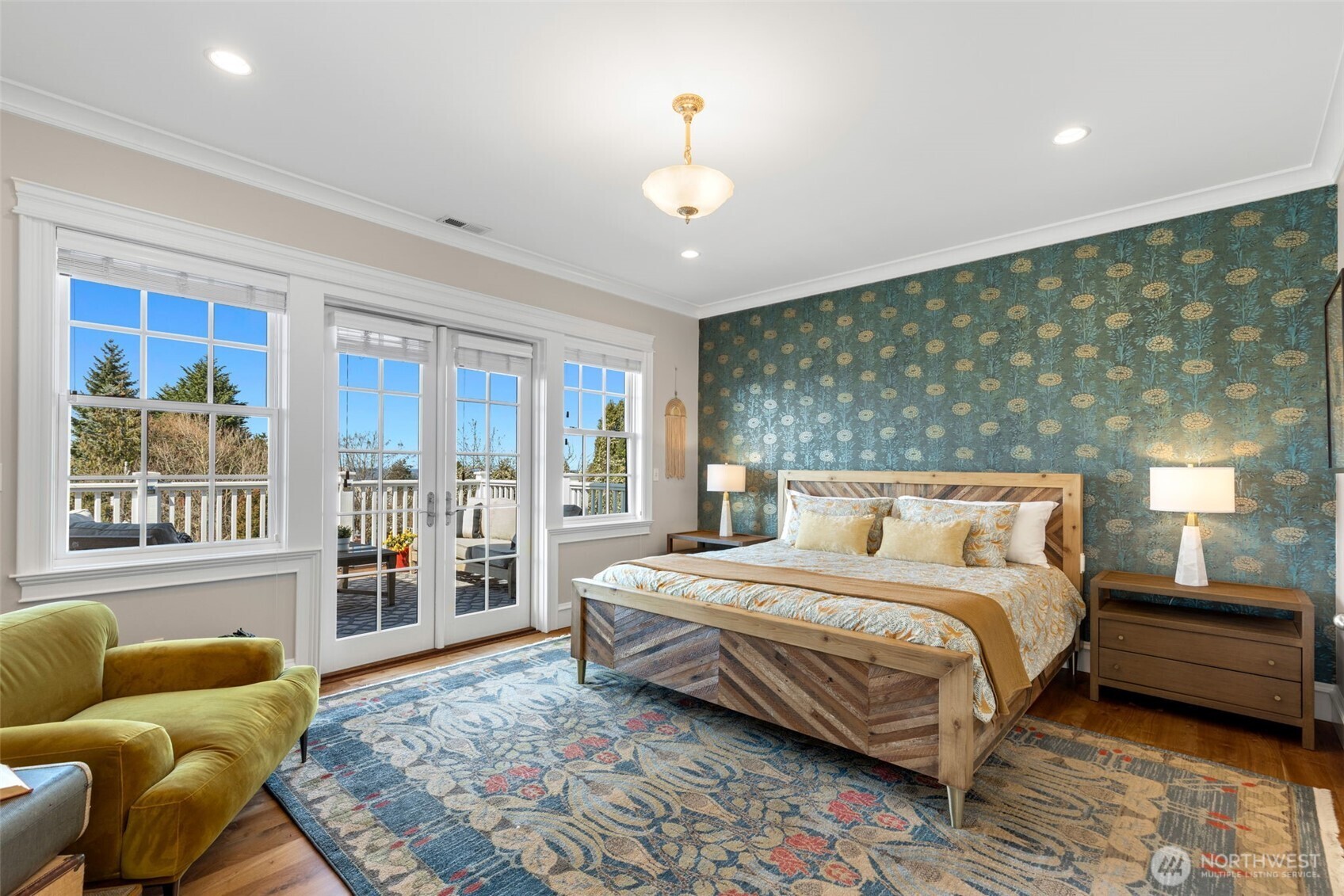 3723 41st Avenue Southwest Seattle, WA 98116 - Photo 18 of 40 a bedroom with a bed and glass window