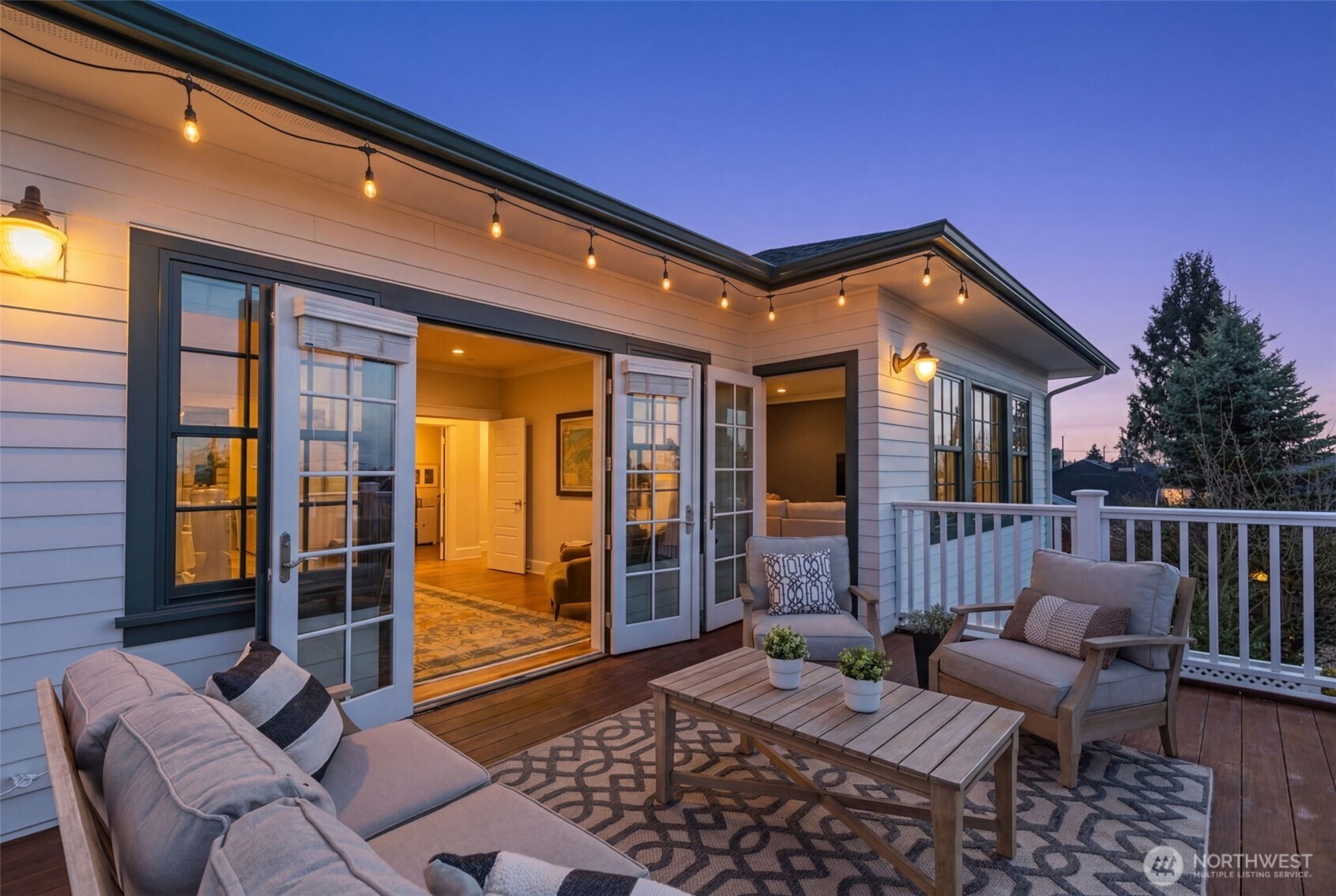 3723 41st Avenue Southwest Seattle, WA 98116 - Photo 20 of 40 a view of a patio with a table and chairs