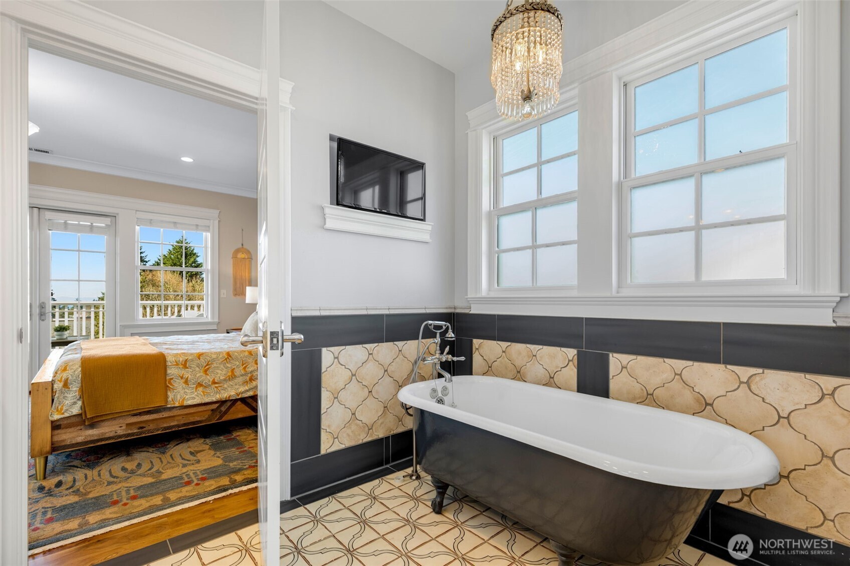 3723 41st Avenue Southwest Seattle, WA 98116 - Photo 22 of 40 a bedroom with furniture and a window