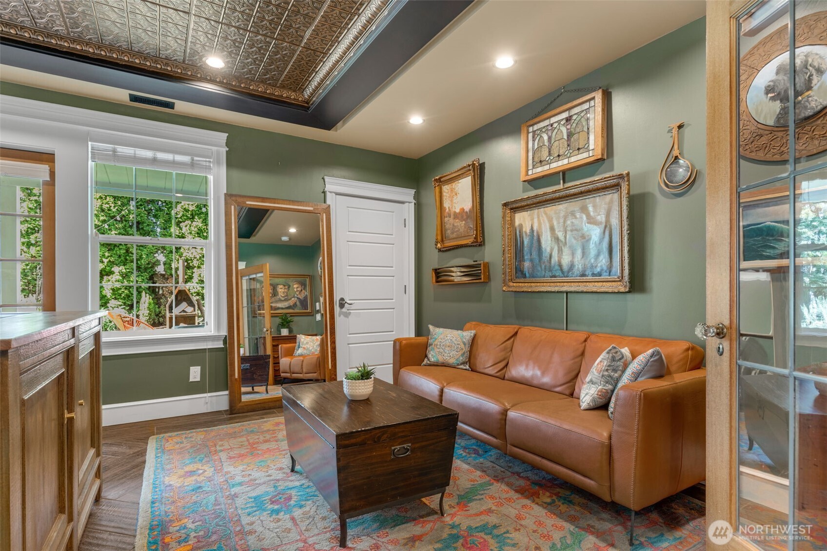 3723 41st Avenue Southwest Seattle, WA 98116 - Photo 30 of 40 a living room with furniture and a flat screen tv