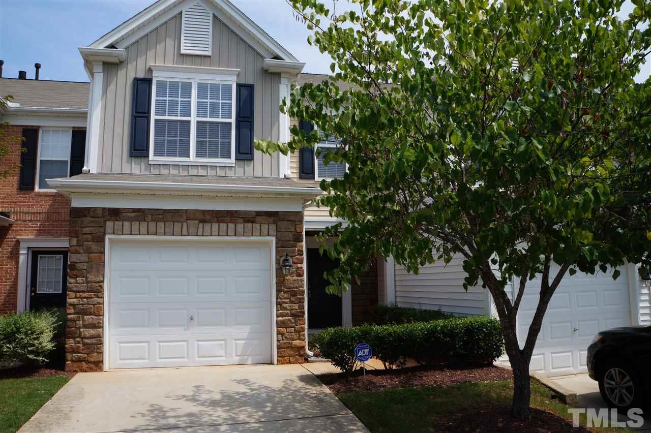7036 Racine Way Raleigh, NC 27615 - Photo 1 of 22 a front view of a house with garden