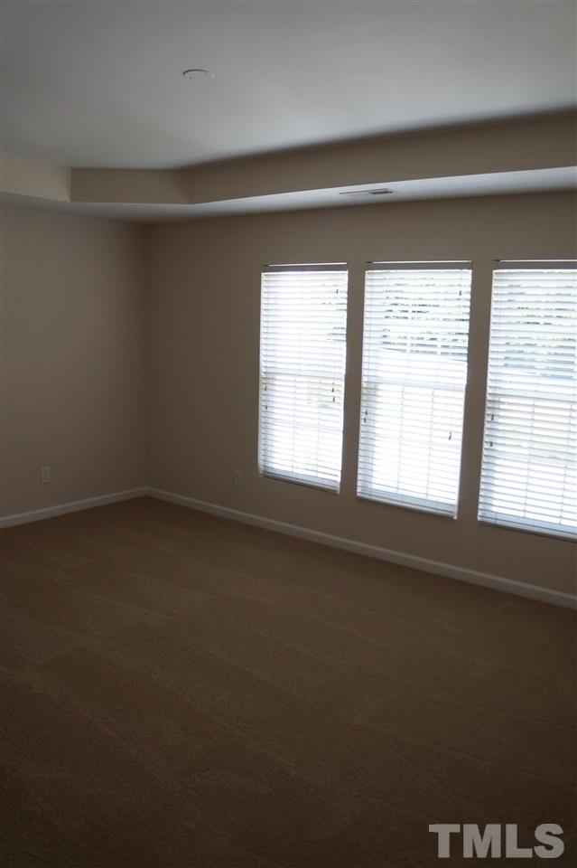 7036 Racine Way Raleigh, NC 27615 - Photo 12 of 22 a view of an empty room with a window