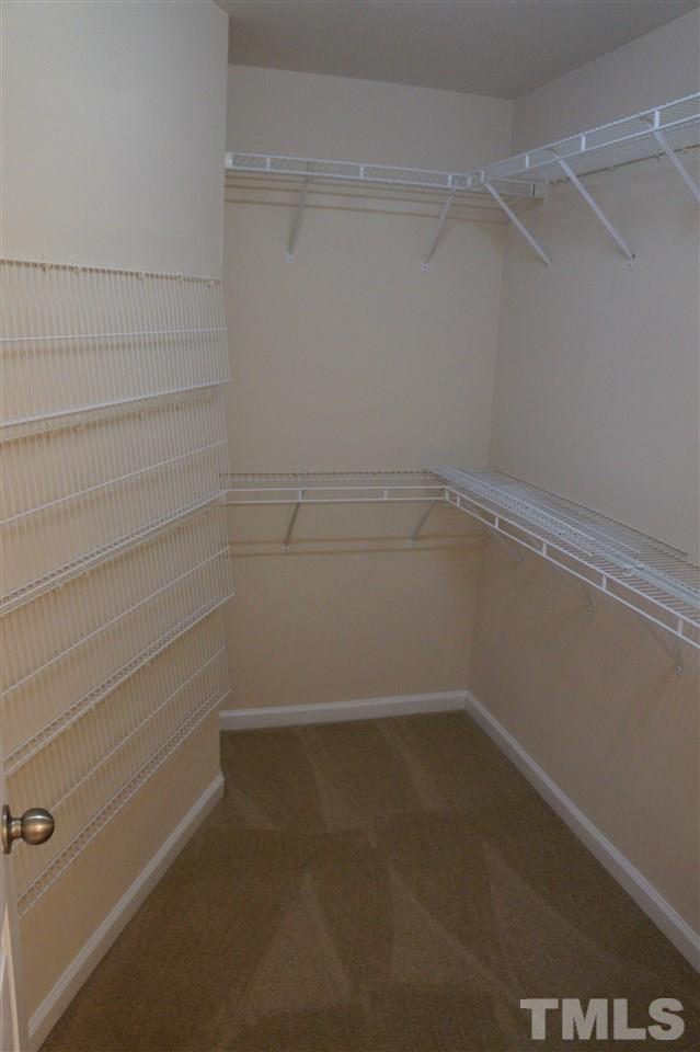 7036 Racine Way Raleigh, NC 27615 - Photo 15 of 22 a empty closet with white paint