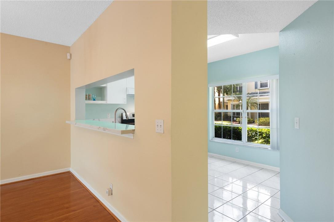 11030 Palm Ridge Lane, Unit 17 Tamarac, FL 33321 - Photo 14 of 32 Kitchen/Dining pass-through