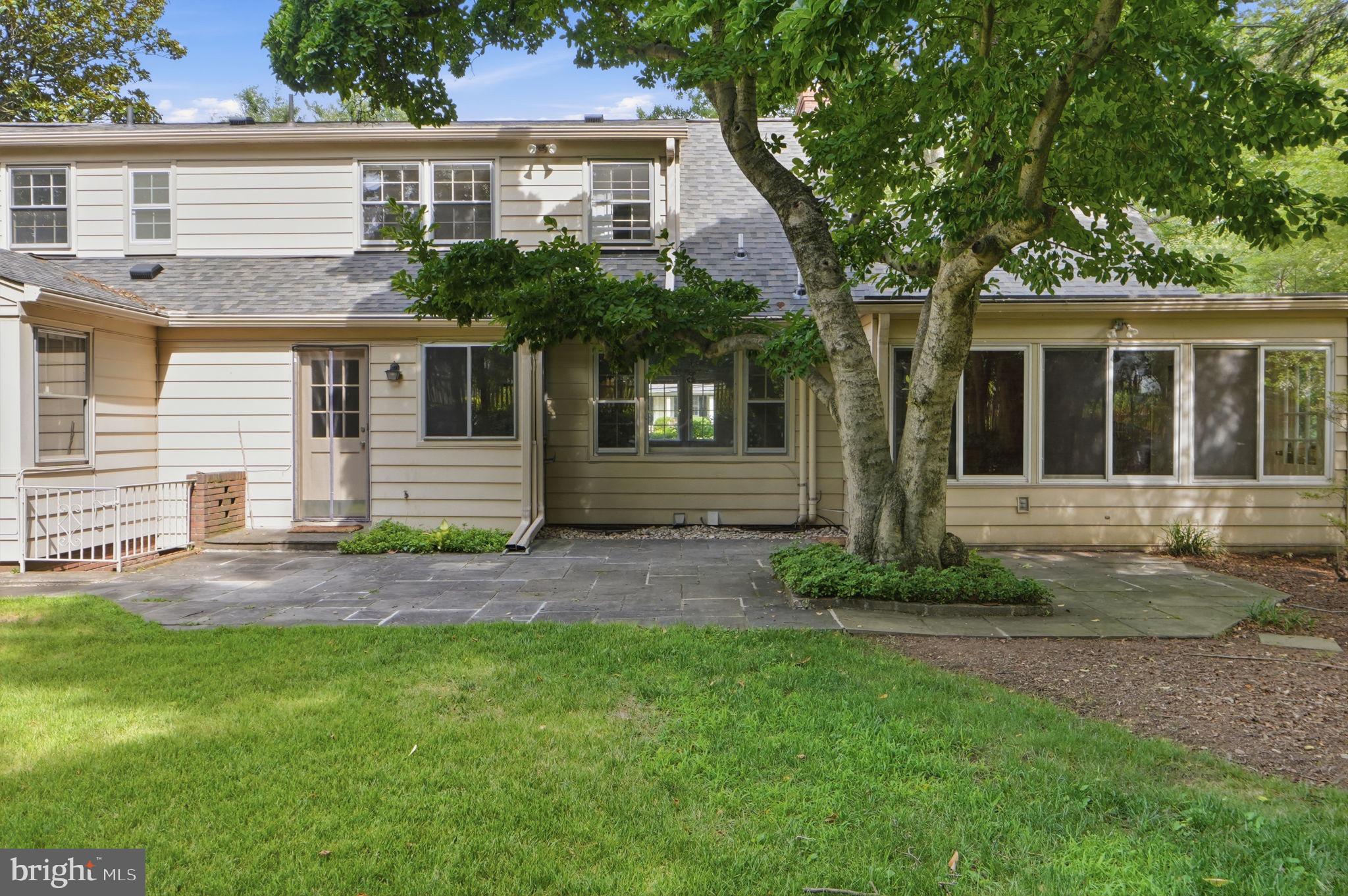 5910 Overlea Road Bethesda, MD 20816 - Photo 53 of 56 front view of a house with a yard
