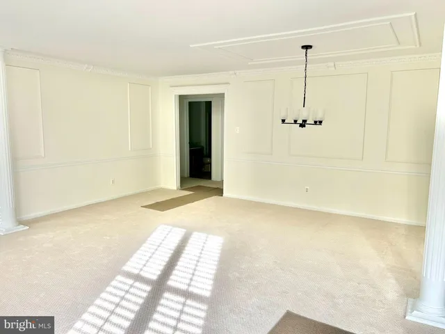 a view of a room with a large window