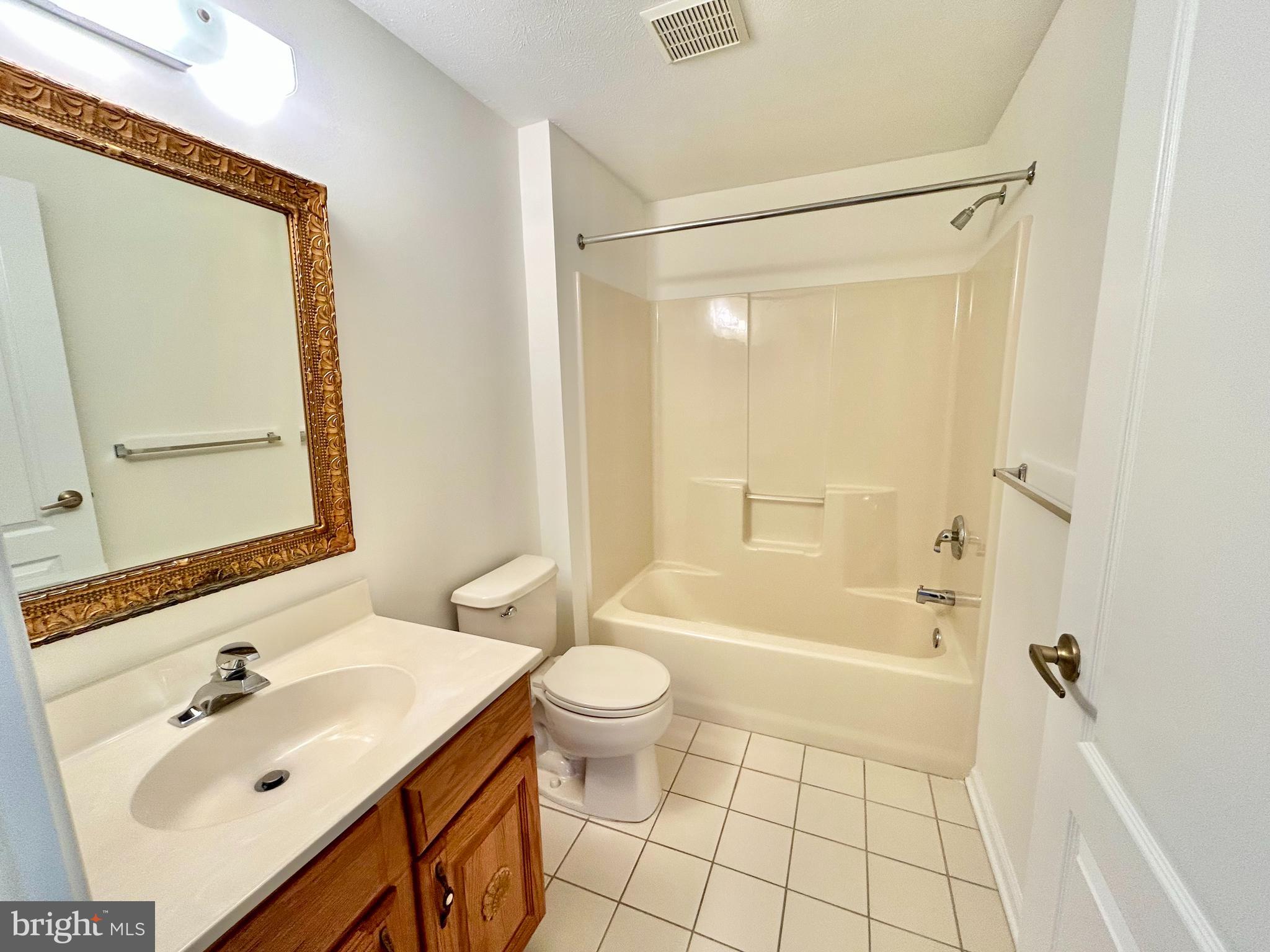 46 Maple Leaf Circle Sewell, NJ 08080 - Photo 20 of 35 a bathroom with a sink mirror toilet and bathtub