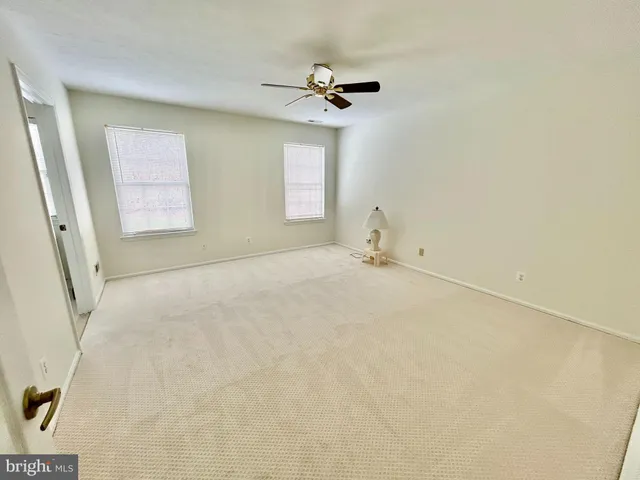 wooden floor in a room with a window