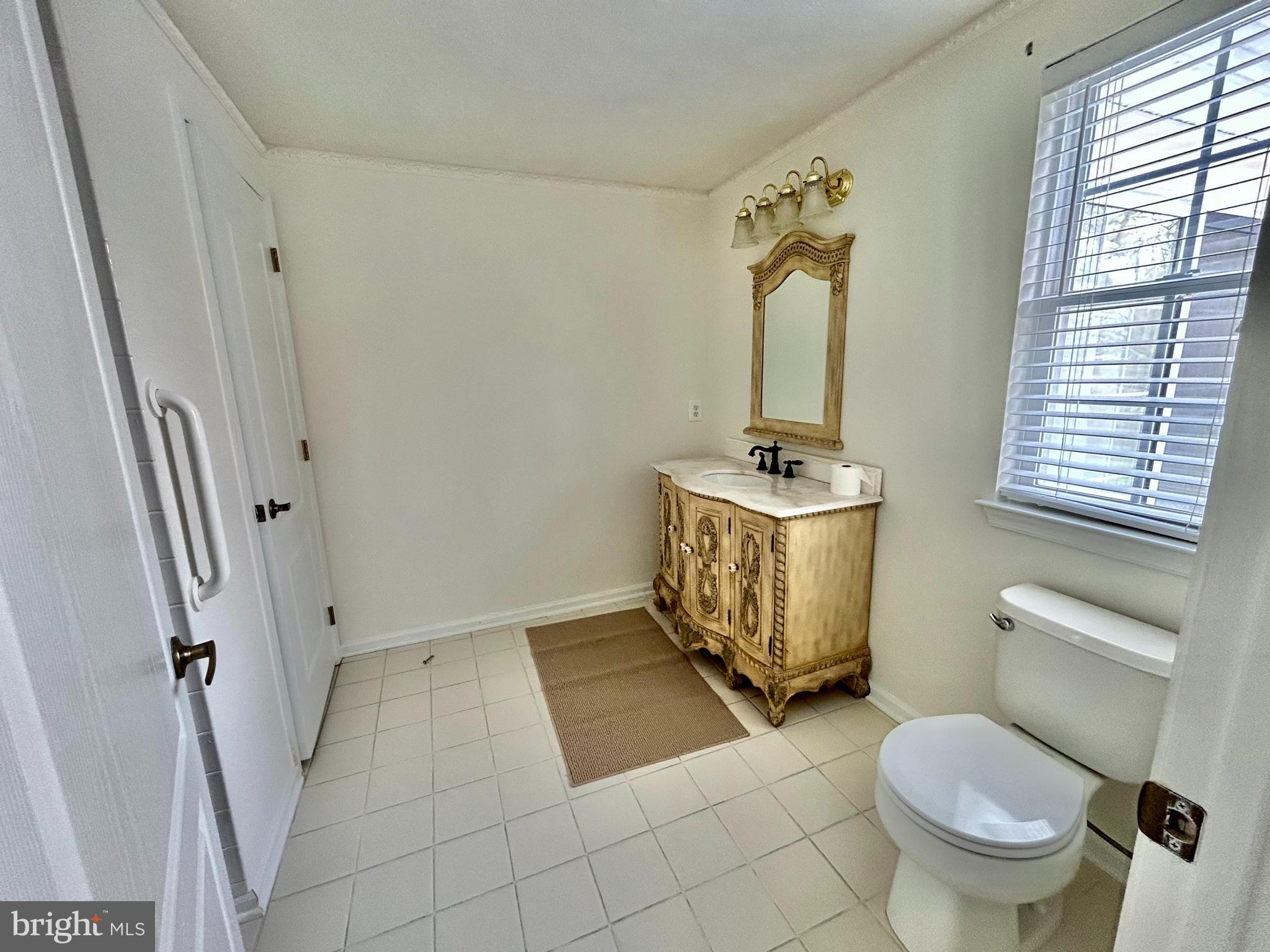 46 Maple Leaf Circle Sewell, NJ 08080 - Photo 22 of 35 a bathroom with a granite countertop toilet sink and mirror