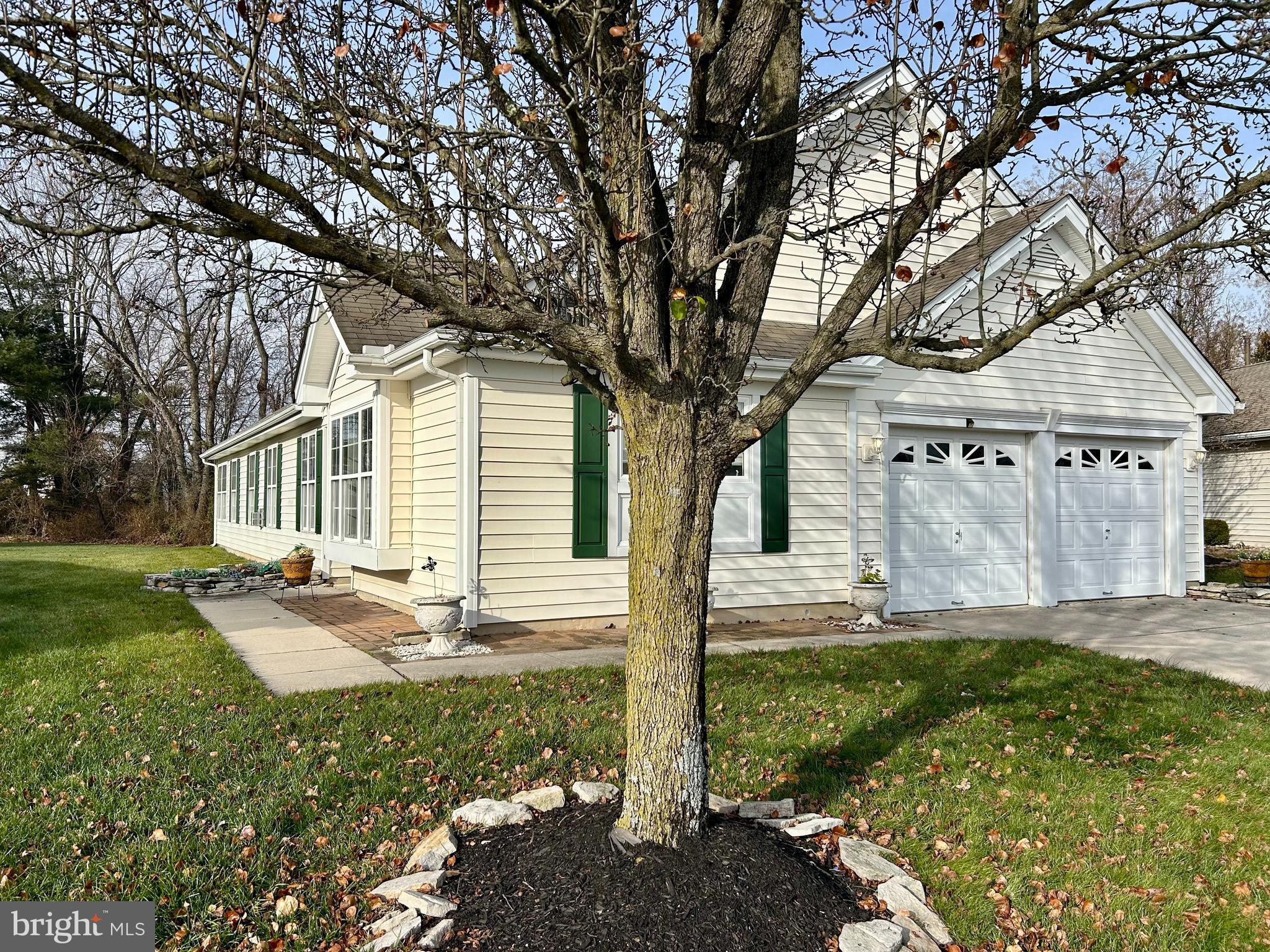 46 Maple Leaf Circle Sewell, NJ 08080 - Photo 3 of 35 a view of a house with backyard and a tree