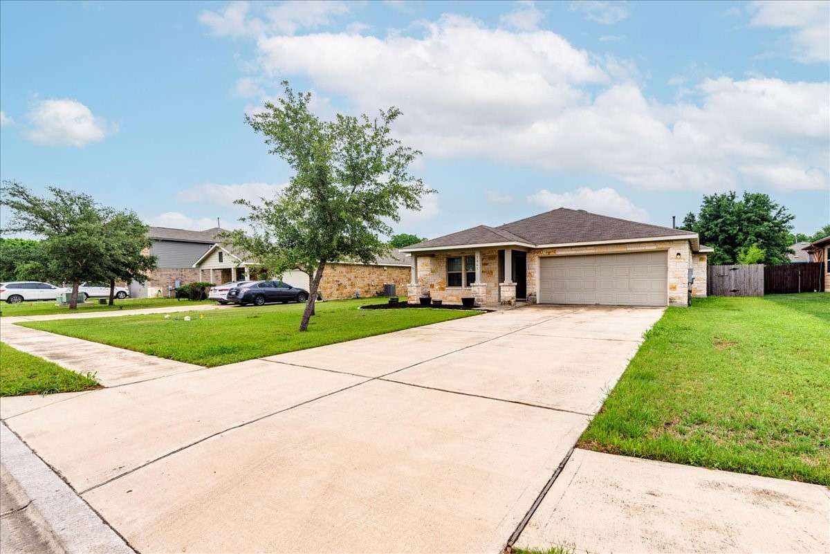 1061 Violet Lane Kyle, TX 78640 - Photo 28 of 34 Front view of large driveway in front of home