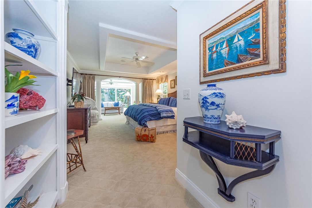 910 Seagrape Lane Vero Beach, FL 32963 - Photo 13 of 36 a living room with furniture and a baby crib
