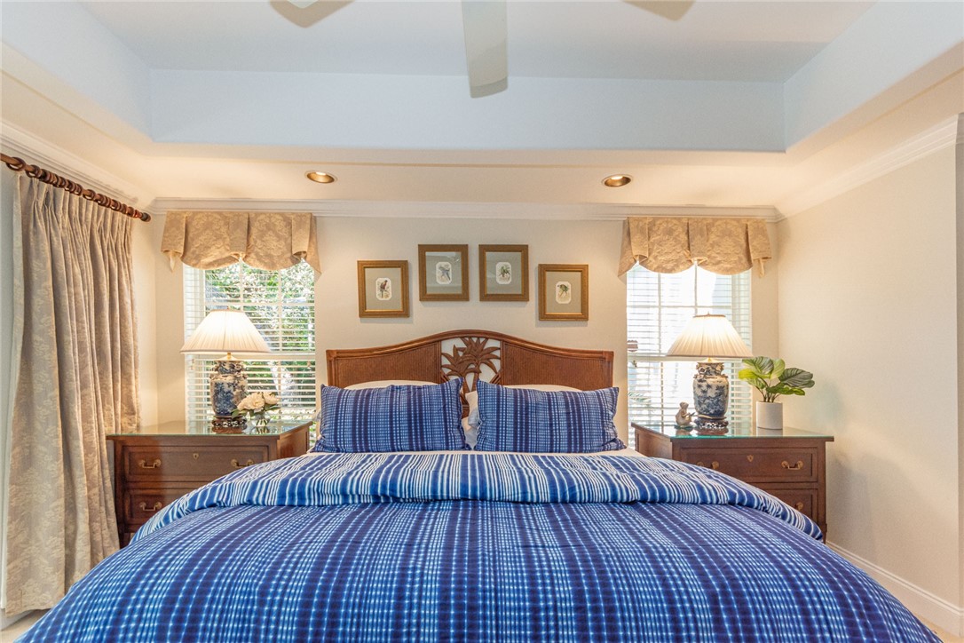 910 Seagrape Lane Vero Beach, FL 32963 - Photo 16 of 36 a view of a livingroom with furniture and wooden floor