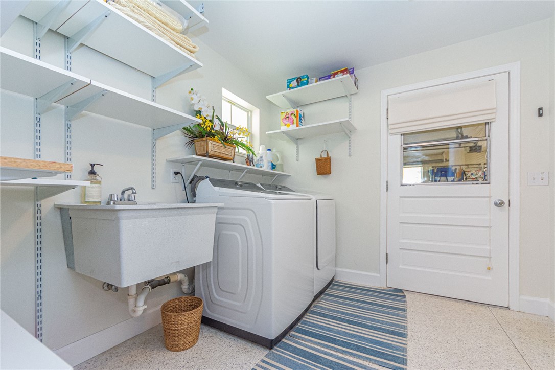 910 Seagrape Lane Vero Beach, FL 32963 - Photo 26 of 36 a room with storage and utility