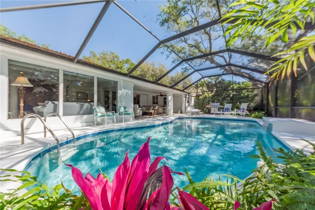 a view of swimming pool with a patio